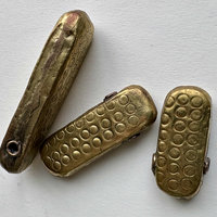 African Debossed-Metal Hollow Pendants: Trio 1