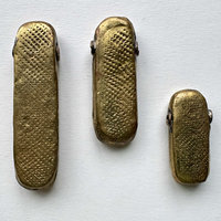 African Debossed-Metal Hollow Pendants: Trio 2