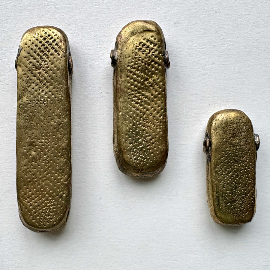 African Debossed-Metal Hollow Pendants: Trio 2